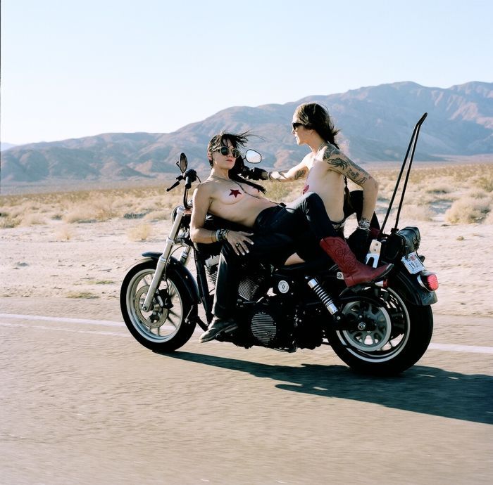 Girls on a motorcycle in Genoa